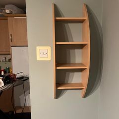 Wall shelving unit