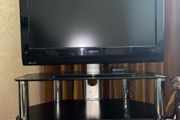 Glass table with TV