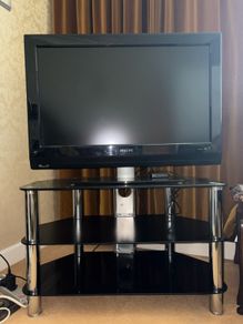 Glass table with TV