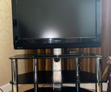 Glass table with TV