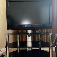 Glass table with TV