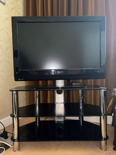 Glass table with TV