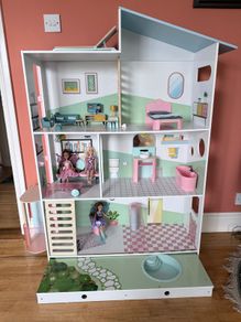 Dolls House with Dolls and Furniture