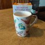 Butterfly Shaped Handle Ceramic Mug, decorated with various colorful butterfly graphics. 3D ceramic butterfly molded directly onto the handle. New in Box. Image 6
