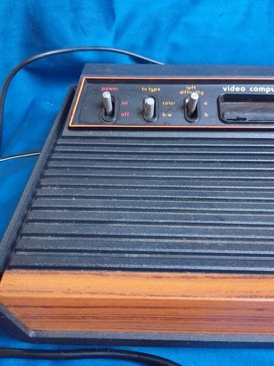 Atari 2600 'woody' console set with ganes