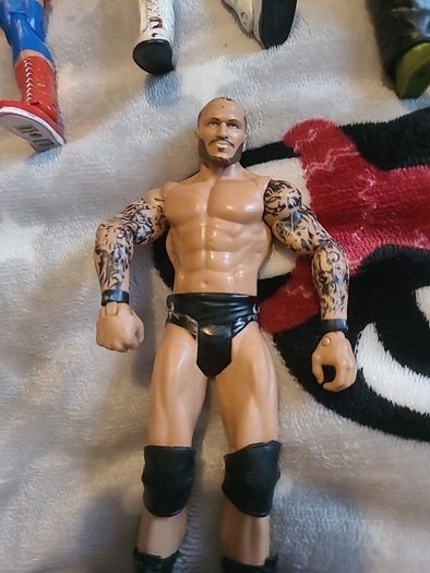 13 WWE wrestling figures