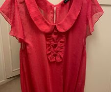 Raspberry pink top with Peter Pan collar and flutter/frill sleeve