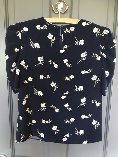 Pennys shirt sleeved girls top aged 10-12 years