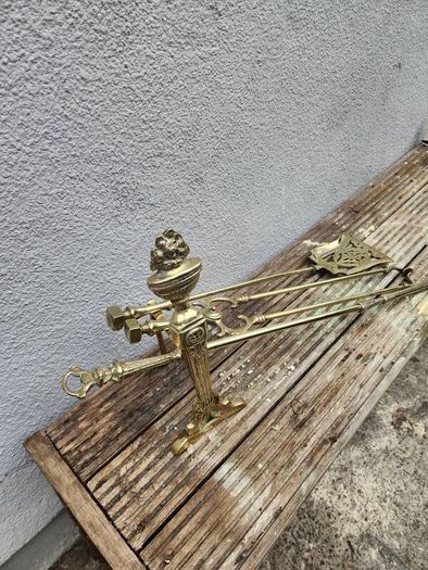 antique polished fire dog and irons
