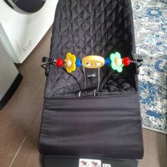 Baby rocking chair with toys