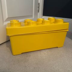 Yellow Lego storage box
