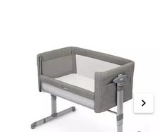Joie Roomie Glide Bedside Crib free delivery !