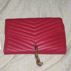 Red clutch bag