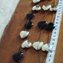 Stylish Long Necklace of Black and Gold Hearts. Image 5