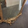 Two distinct antique giltwood mirrors with elaborate French-style ornamentation Image 9