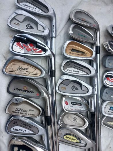 A selection of golf clubs and bags. NOT SELLING SEPARATE