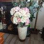 flowers in tall vase Image 2