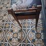 Antique piano stool upholstered in peacock fabric Image 6