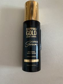 Dripping gold tanning serum