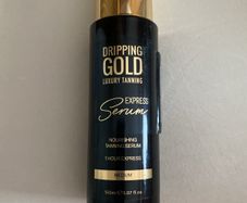 Dripping gold tanning serum