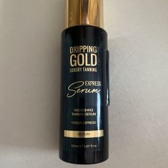 Dripping gold tanning serum