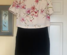 Ted Baker black and floral playsuit  (size 2)
