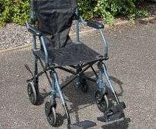 Folding travel wheelchair