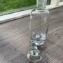 Tall heavy clear glass spirit decanter with large solid glass stopper. Image 2