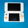 Nintendo 2DS XL White & Orange Image 2