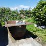 Cast iron brown bath with fittings, brown Royal Dalton toilet and cistern, brown wash hand basin with taps. Image 3