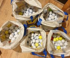 Bags of 100 washed top branded golf balls