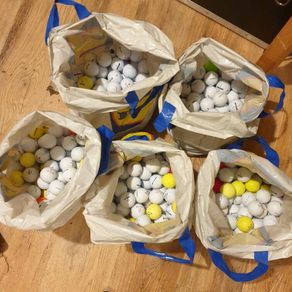 Bags of 100 washed top branded golf balls