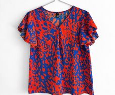 Pre Owned Cobalt Blue & Orange Abstract Print Flutter Sleeve Top