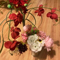 Artificial flowers with glass jars