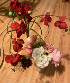 Artificial flowers with glass jars