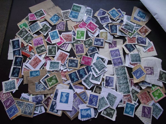 A box with collection of stamps from Great Britain