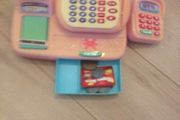 toy cash register and iron
