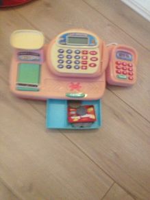 toy cash register and iron