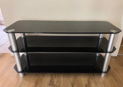 Elegant glass cabinet, books, tv
