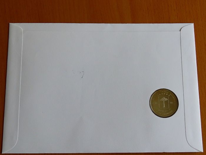 Rare Stegosaurus Dinosaur coin in vintage stamp cover