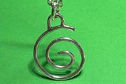 Handmade sterling silver spiral pendant with 18 and 20 inch chain.