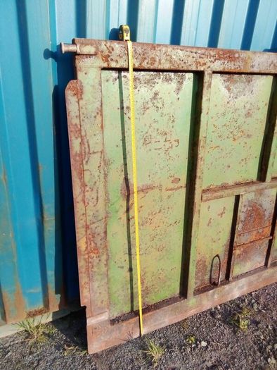 Grain trailer back door