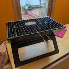 Portable notebook folding grill / firepit