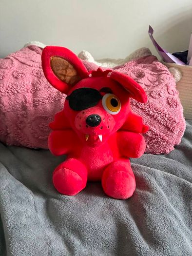 Five Nights at Freddys plushies and dragon figures