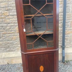 Antique inlaid corner display cabinet.