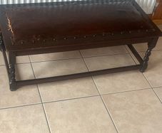 Rare antique low shoe changing bench. With celtic design embossed in the  leather