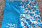 NEW.boy's swim shorts/swimwear .Age7