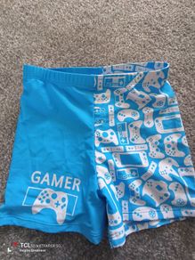 NEW.boy's swim shorts/swimwear .Age7