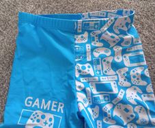 NEW.boy's swim shorts/swimwear .Age7