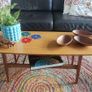 Unusual and Practical Mid-Century Modern Wooden Coffee Table with a Hard-Wearing Wood-Patterned Melamine Top and Slatted Magazine Shelf Image 5